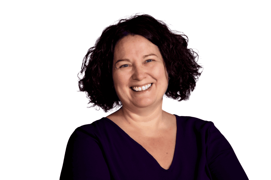 Profile picture of Natalie Spall, dark curly hair and smiling